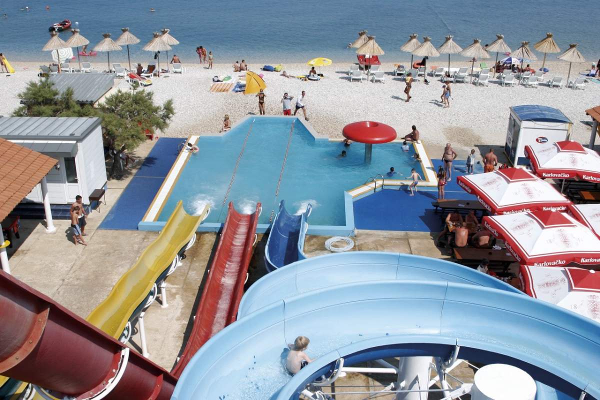 Water slides on the Vela plaža beach in Baška