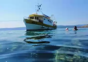 Blue Cave and Golden Beach with lunch on a fishing boat